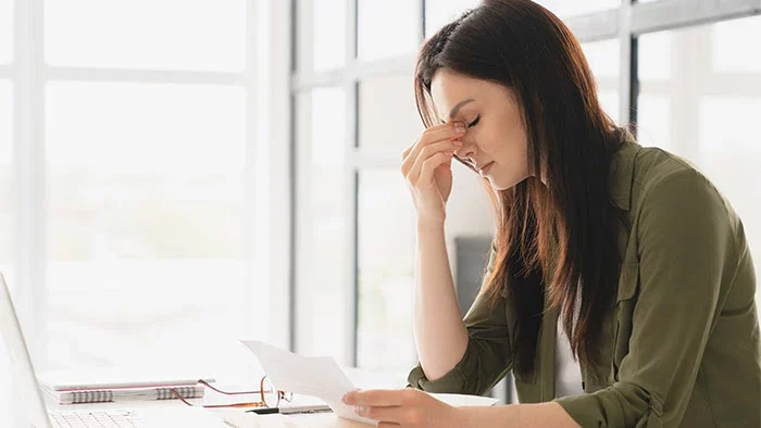 woman stressing about money