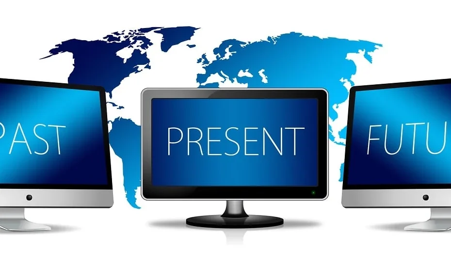 computer monitors with past, present, future labels