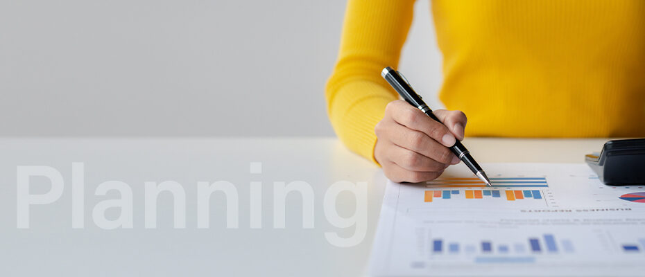 woman reviewing tax reports