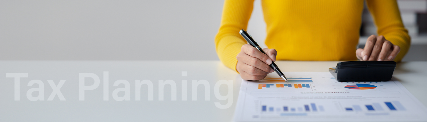 woman reviewing tax reports